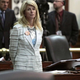 Texas state Sen. Wendy Davis stands after Democrats defeat the GOP abortion bill. (Erich Schlegel/Getty Images News)
